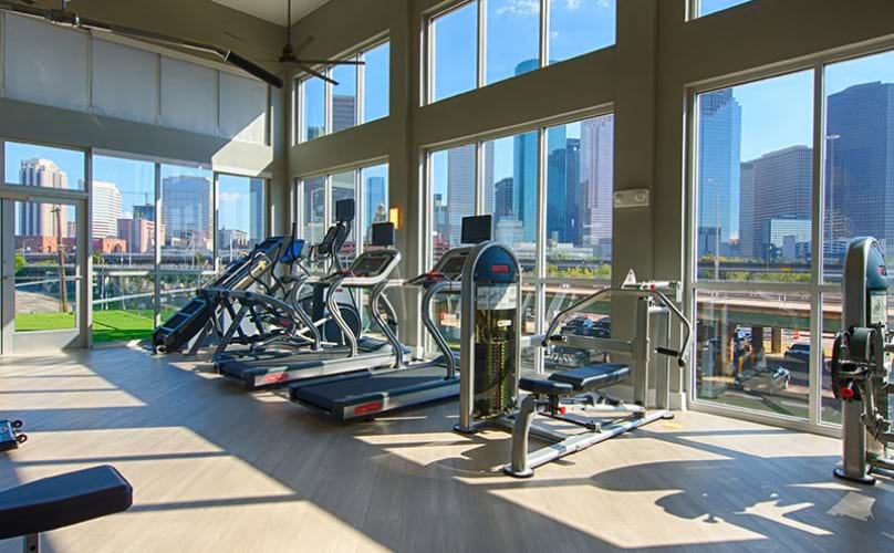 fitness center with large windows